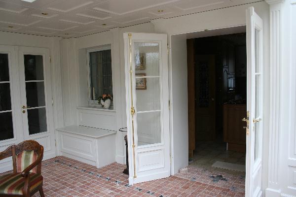 Übergang vom Wohnhaus zum Wintergarten Übergang vom Wohnhaus zum Wintergarten